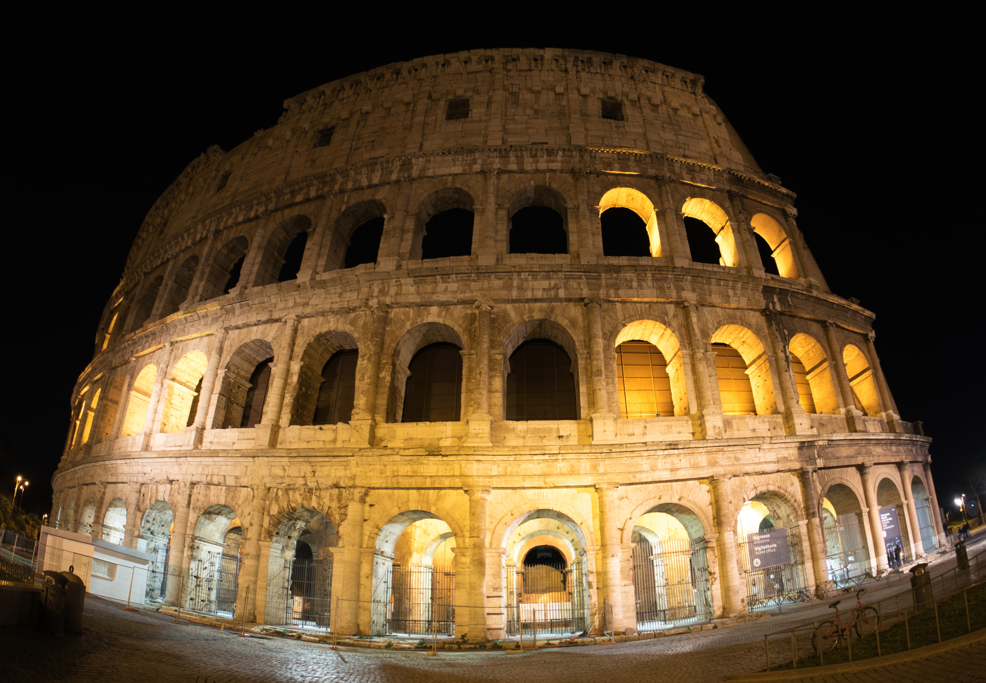 The Colosseum in Rome illuminated in the evening